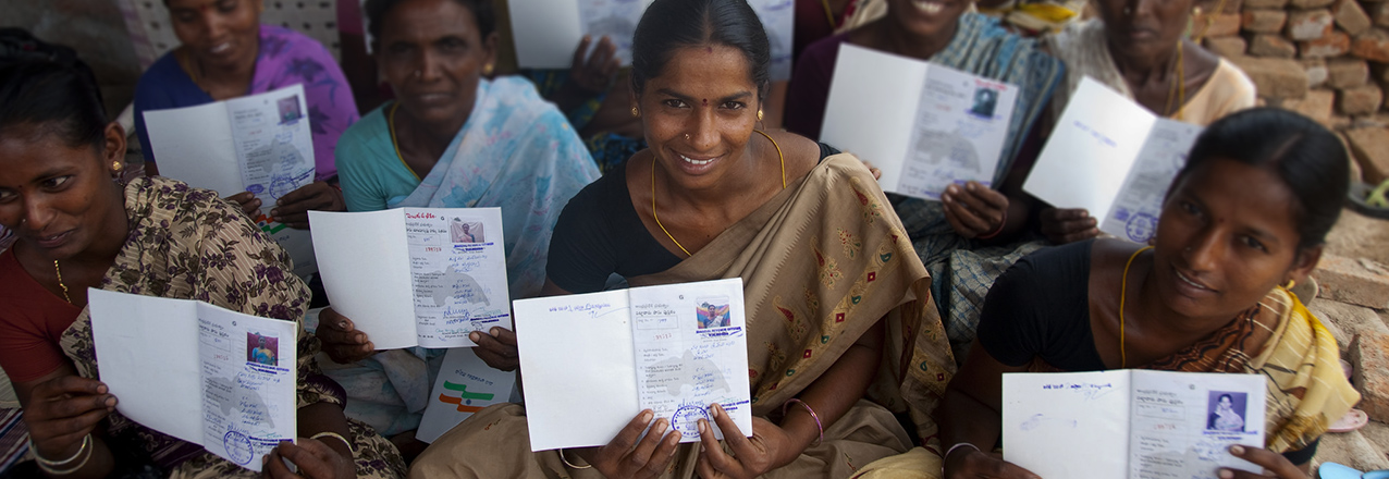 Indian women holding land titles